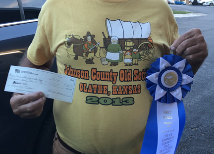 KSD was voted for the best vintage car and was awarded a monetary prize as well as a big blue ribbon.