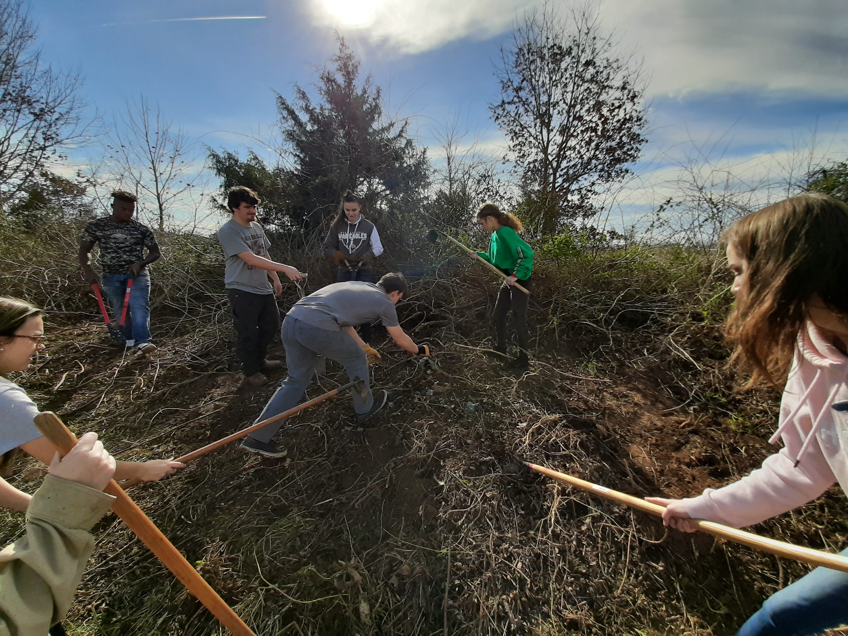 Ag students cleaning the fence row Ag students cleaning the fence row