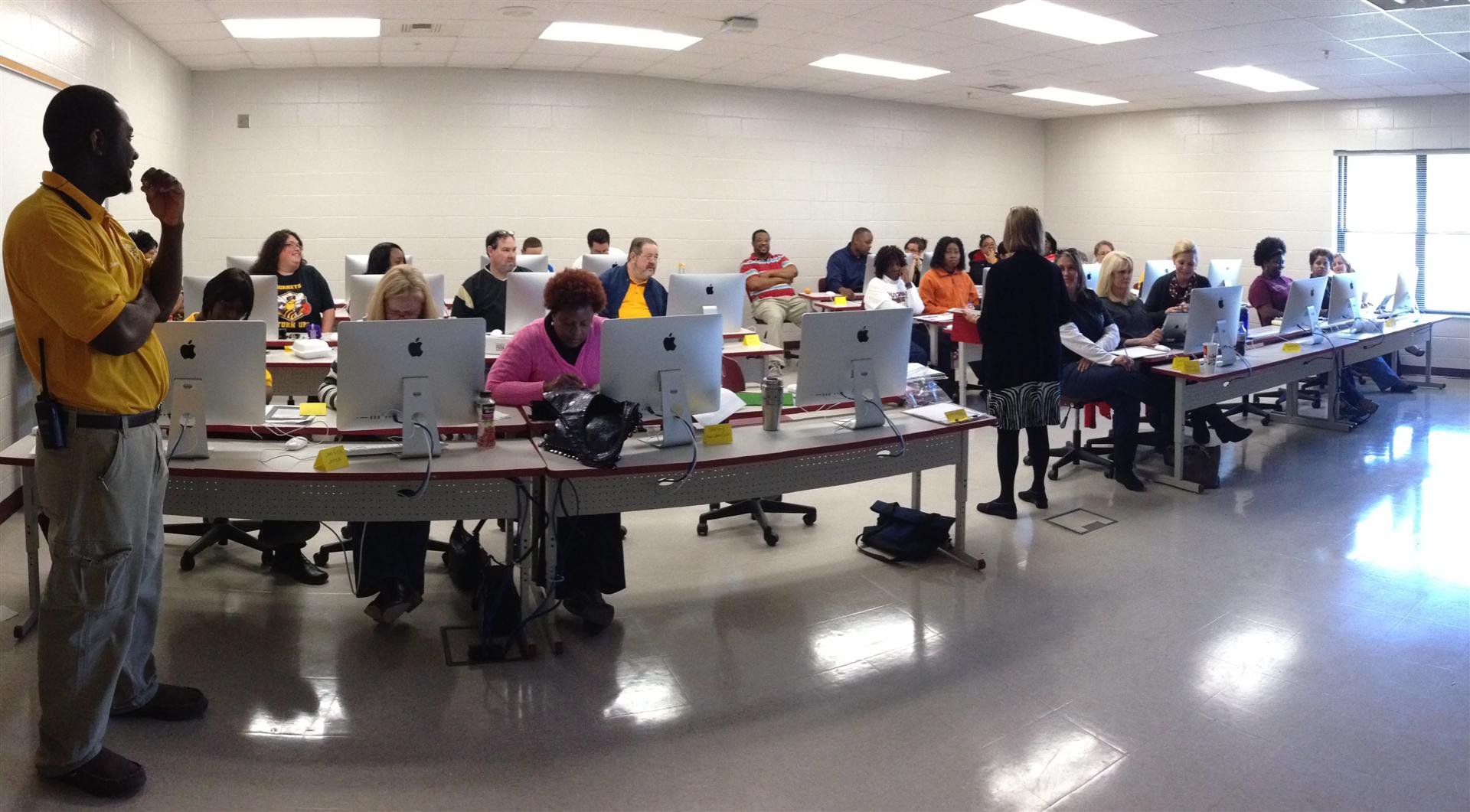 Teachers and administrators participate in Apple Training 