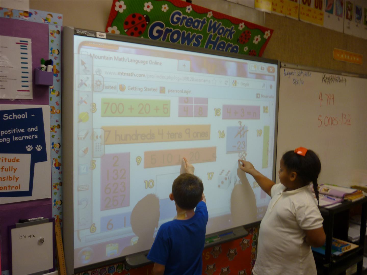Students using Smart Board