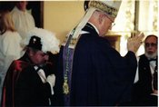 Shown with Bishop David E. Foley are Fourth Degree members Jerome C. Bradley (left) and Gaeton Conte